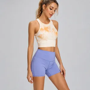 Top sportivo cropped tie-dye con pantaloncini da yoga viola a vita alta