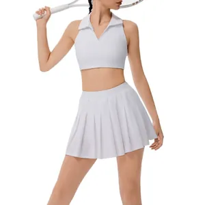 Set sportivo da tennis bianco per donna con top polo senza maniche e gonna a pieghe