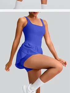 Side detail of a sleeveless electric blue athletic tennis dress with a flared skirt