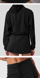 Detail of black athletic sweatshirt and skirt set with adjustable drawstring waist