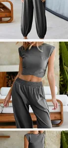 Detail view of women's grey crop top and elastic waist joggers casual set