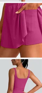 Detailed view of a magenta tennis skirt showing the pocket and back of the matching sports tank top