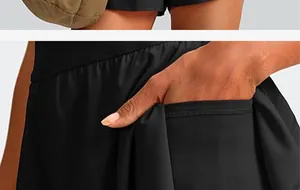 Detail shot of functional side pocket on black quick-dry athletic tennis skirt