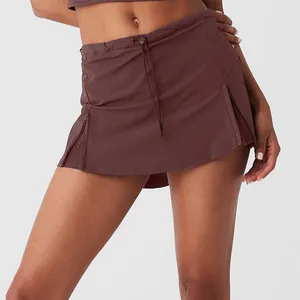 Dark brown athletic sports skort for women with drawstring waist and side zipper mesh details