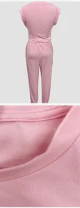 Close-up fabric texture and back view of a pink sleeveless two-piece women's tracksuit