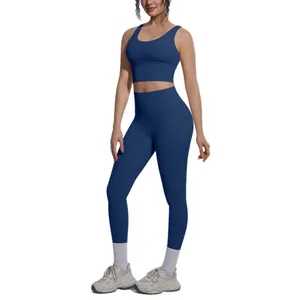 Premium navy blue two-piece yoga set for women with sports bra and high-waisted leggings