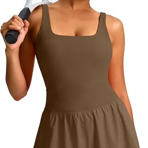 Brown sleeveless square neck tennis dress with pleated skirt for yoga and sports.