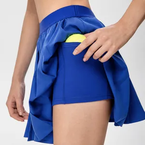 Jupe de tennis plissée bleue pour femmes avec short de sécurité et poche latérale utile