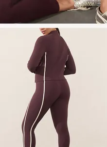 Detailed back view of burgundy yoga set with white side stripes and slim fit design