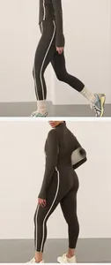 Detailed views of women's side-striped yoga set featuring long-sleeve top and leggings