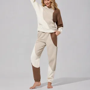 Set felpa con cappuccio e pantaloni jogger color-block per donna ideale per sport e fitness