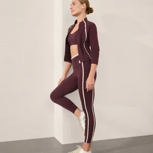 Professional 2-piece burgundy yoga set with white side stripes and slim fit zip jacket