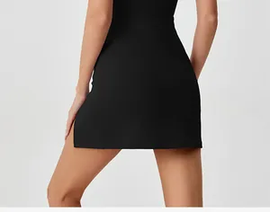 Back view detail of black quick-dry sports dress showing side slit and slim fit
