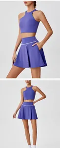 Ensemble haut de yoga asymétrique violet et jupe de tennis plissée à taille haute