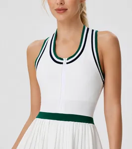Close-up view of functional front zipper design on white sleeveless sports tennis dress