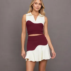 Sportset met polohals top in kleurblok en tennisrok met hoge taille