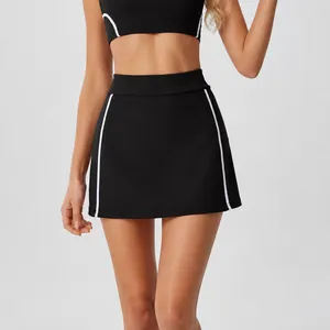 High-waisted black tennis skort with white side piping for fitness and running workouts