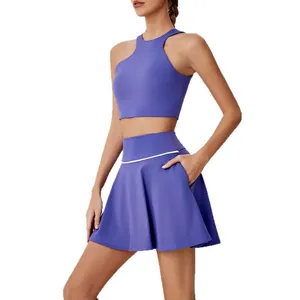 Ensemble de haut de yoga dos nu asymétrique violet et jupe de tennis sport taille haute