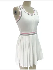 Detailed side view of white tennis dress featuring front zipper and pink contrast waist