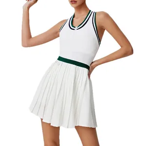 Stylish white women's tennis dress with green stripes and a pleated skirt golf