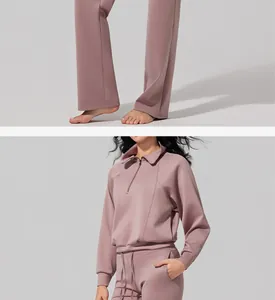 Detailed view of women's dusty rose half-zip sweatshirt and high-waist yoga pants set.