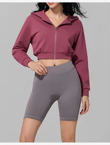 Detailed view of women's maroon cropped zip-up hoodie for fitness and casual wear