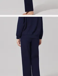 Vista trasera de un conjunto de sudadera y pantalón ancho azul marino para mujer
