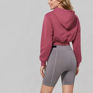 Women's cropped zip-up hooded sweatshirt in mauve pink for sports and casual wear