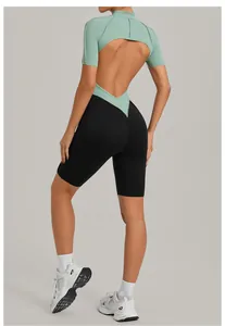 Back view of backless fitness jumpsuit with mint green and black contrast colors