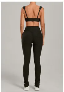 Back view of charcoal grey two-piece yoga set with adjustable straps and high-waisted leggings