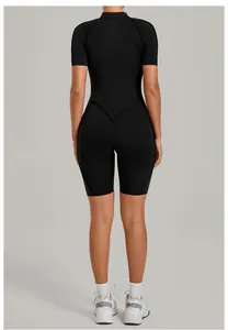 Back view of a high-neck black athletic one-piece yoga jumpsuit for fitness women.