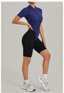 Detail view of a blue and black color-block backless fitness bodysuit with a zipper collar.