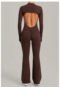 Back view of brown long sleeve backless flare yoga jumpsuit showing cutout detail