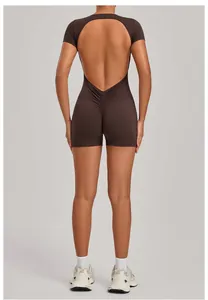 Back view of brown backless yoga romper showing scrunch butt and open back detail