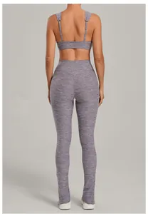 Back view of a two-piece heathered purple yoga set with adjustable strap bra and leggings