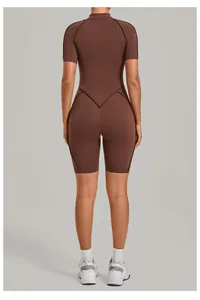 Back view of a brown short sleeve yoga bodysuit with stand collar and V-seam detail