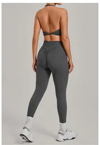 Rear view of grey high-waisted yoga leggings with a professional ruched scrunch butt design