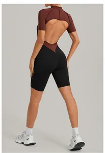Detail shot of open back color-blocking athletic bodysuit with stand collar design