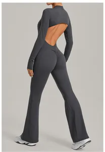 Close-up detail of backless grey yoga jumpsuit featuring long sleeves and flared legs