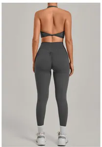 Detailed back view of dark grey yoga set with scrunch butt leggings and halter top