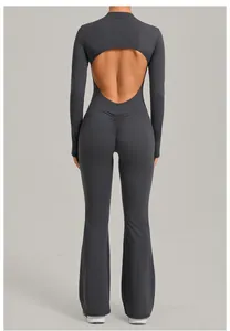 Back view of gray long-sleeve yoga jumpsuit with flared pants and circular open back design
