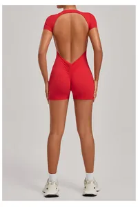 Detailed back view of a vibrant red backless yoga romper with supportive scrunch butt design