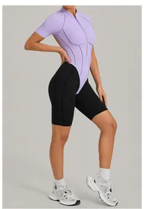 Detailed side view of a purple and black color-block backless fitness jumpsuit for yoga