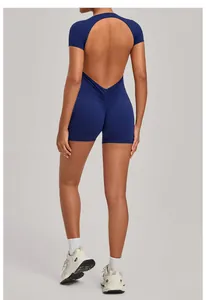 Rear view detail of a navy blue backless yoga romper with ruched scrunch butt design
