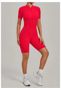 Detailed view of red women's half-zip yoga bodysuit with high neck design