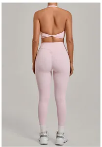Detailed back view of a light pink yoga set with scrunch butt leggings and halter top