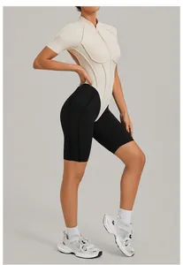 Detailed side view of two-tone backless fitness bodysuit with stand collar and zipper detail