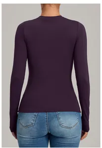 Back view of a slim-fit plum long-sleeved yoga top with a smooth, breathable finish