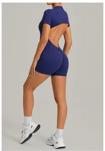 Detailed view of a dark blue backless yoga bodysuit featuring a scrunch butt design