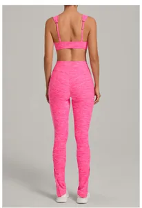 Rear view of pink heathered two-piece yoga set showing sports bra and leggings
